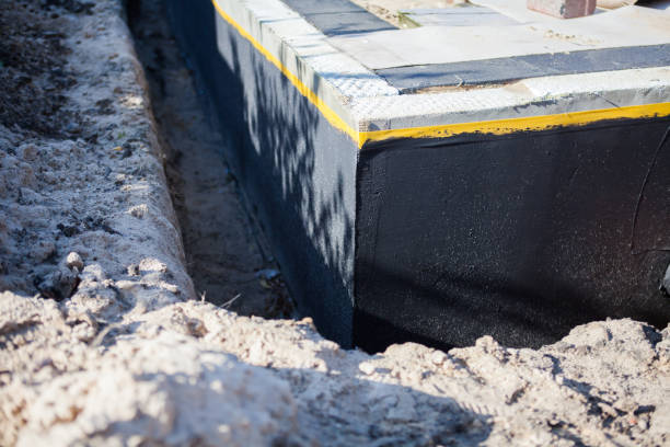 Professional Waterproofing technician working in Glenmoore, PA